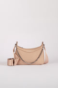 A light beige leather shoulder travel bag with a silver chain strap and a matching wide silver belt, shown on a light gray background. The handbag comes with safety features such as anti theft zipper, slash proof material and RFID protection.