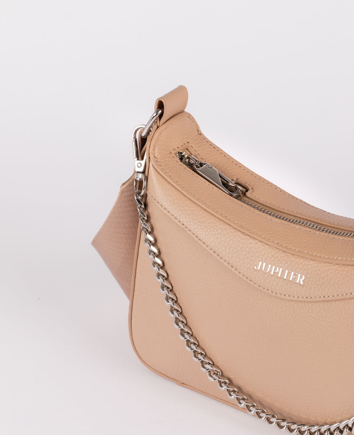 A close-up of a Jupiter beige pebbled leather shoulder travel bag with a silver chain strap and the brand name 'JUPITER' printed on the front, set against a plain white background.